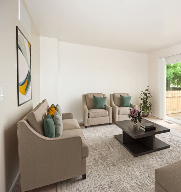 a living room with couches and chairs and a coffee table
