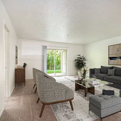 a living room with couches and chairs and a table