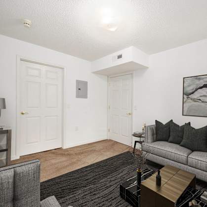 a living room with a couch and a coffee table