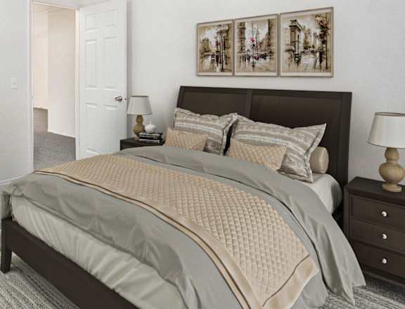 A bedroom with a large bed and a dresser with a mirror above it at Newport Village Apartments, Portage, Michigan