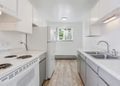 Thumbnail 4 of 6 - White Kitchen at Stratford Plaza South, Denver, CO, 80226
