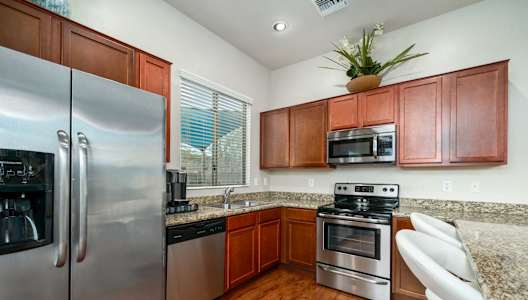 Kitchen with Stainless Steel Appliances at Avilla Preserve Apartment Homes in Tucson Arizona