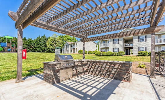 the preserve at ballantyne commons covered patio with grill and pergola