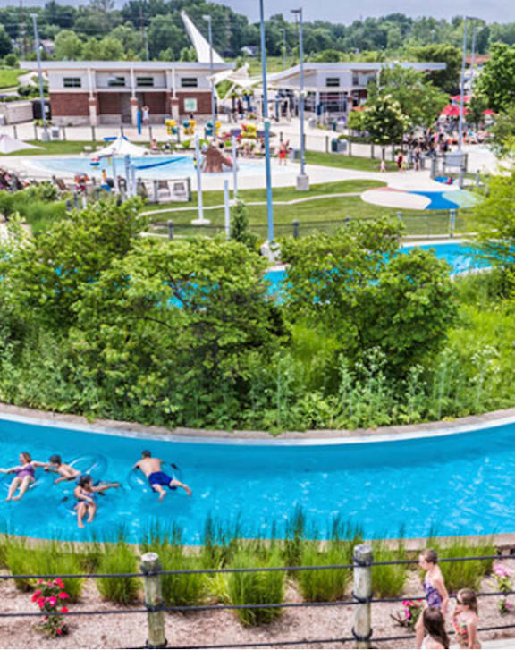 People are enjoying a sunny day at the water park.at Spinnaker Court, Indianapolis