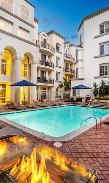 Swimming Pool With Lounge Chairs at The Preston Miracle Mile Apartments, California, 90036