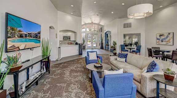 Living room with couch and TV at Allure at Tempe Apartments, Tempe