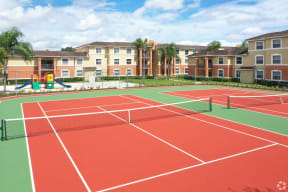 Two tennis courts located adjacent to the playground