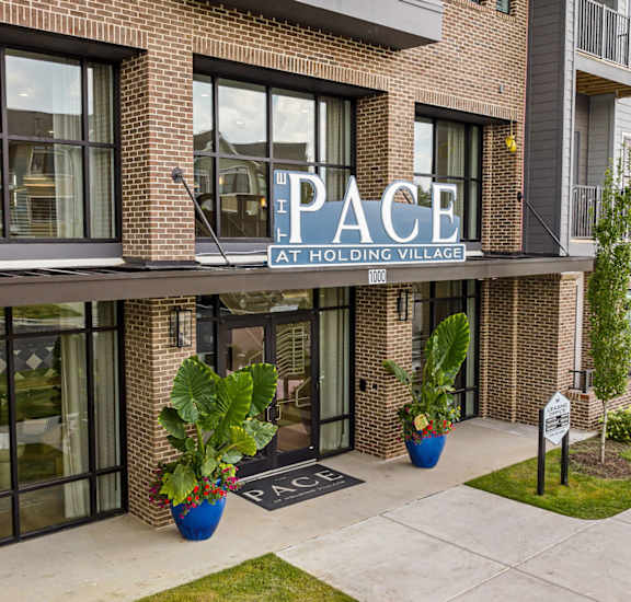 A building with a sign that says "PACE" on it.