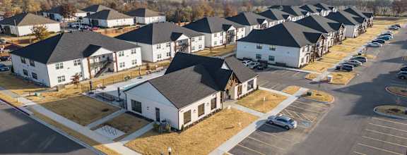 an aerial view of a group of houses in a neighborhood