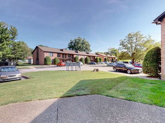 the view of our apartments from our driveway and parking lot