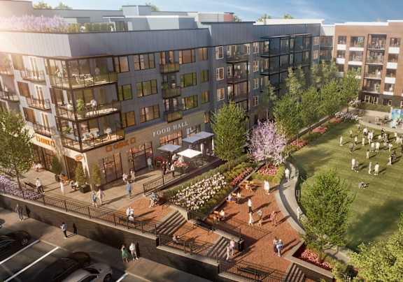 A rendering of a modern apartment complex with a food hall and a park.