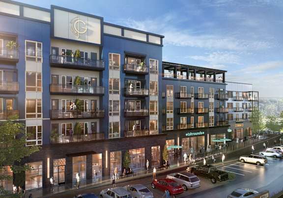 a rendering of a tall building with apartments and cars on the street