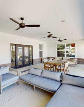 a large office space with a long white desk and four blue chairsat The Slate, Jeffersonville,47130