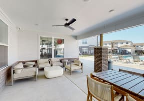 the preserve at ballantyne commons spacious outdoor living area with furniture and a poolat The Slate, Jeffersonville