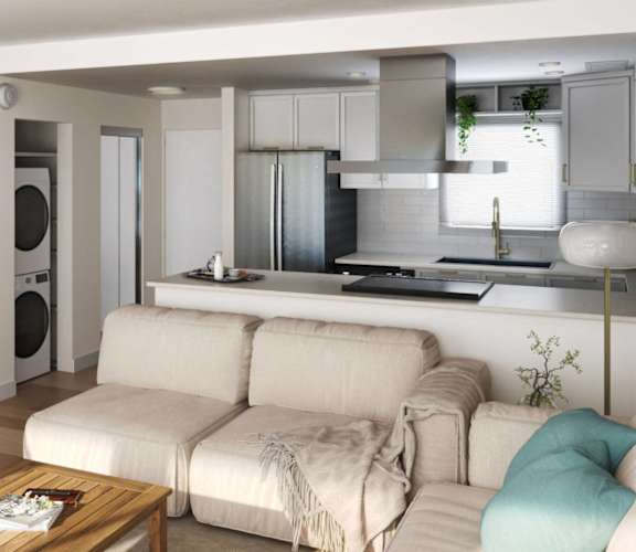 a living room and kitchen with a couch and a table at Ocean Edge @ Laguna Beach Apartments, California