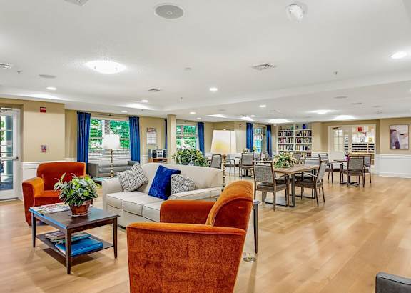 a living room with two couches and a coffee table