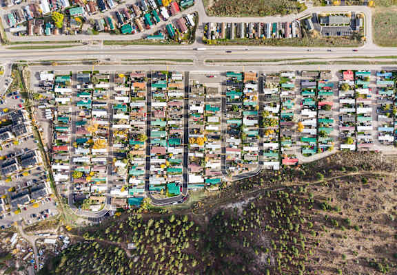 A parking lot full of cars.