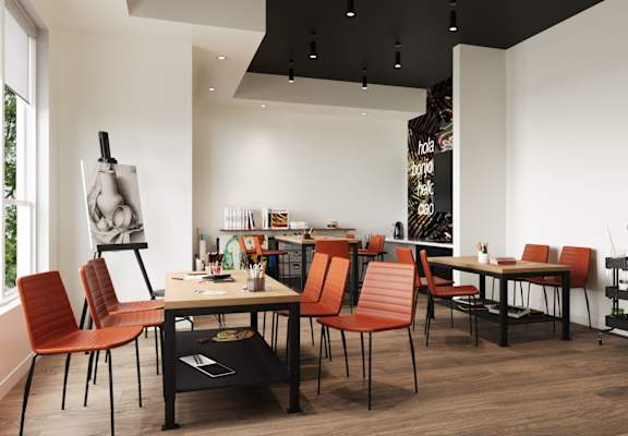 A modern dining room with a table and chairs.