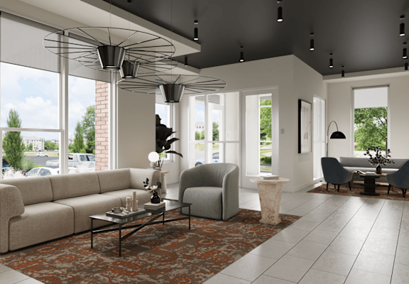 A modern living room with a large window and a view of trees and a building outside.