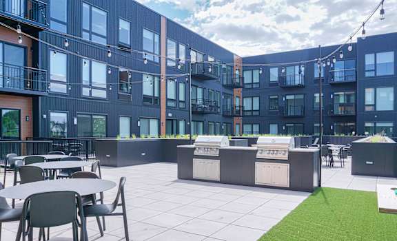 Outdoor Grill With Intimate Seating Area at CityLine Apartments, Minnesota, 55406