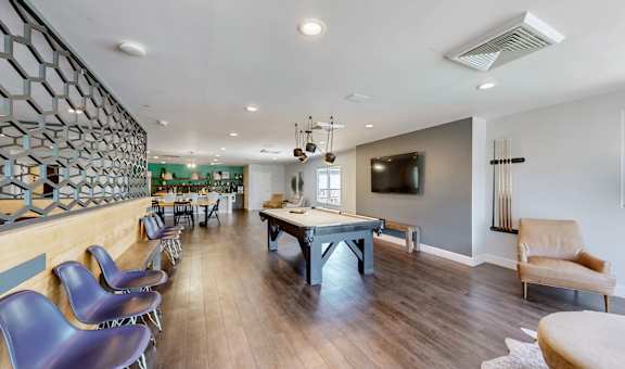 a game room with a pool table and a tv at Halsey Flats, Louisville, KY, 40207