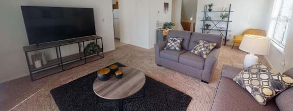 a living room with a couch and a tv  at Antelope Ridge, South Dakota, 57719