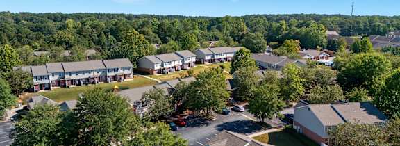 an aerial view of a neighborhood with houses and trees  at Greens at Stonecreek, Georgia, 30038