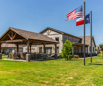 the reserve at city center apartments building exterior flag