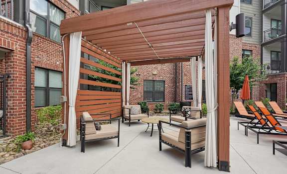 pool cabanas with chairs
