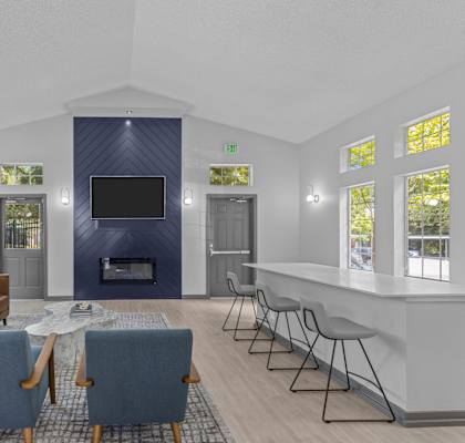 the preserve at ballantyne commons living room with couches chairs and a bar