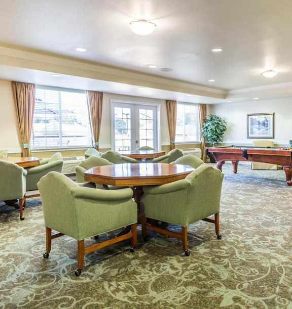 Bright Restaurant with tables at Lakeview Senior Living, Lakewood