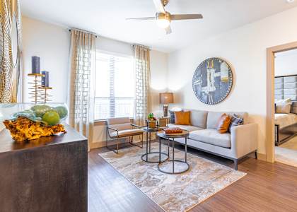 a living room with a couch and a table
