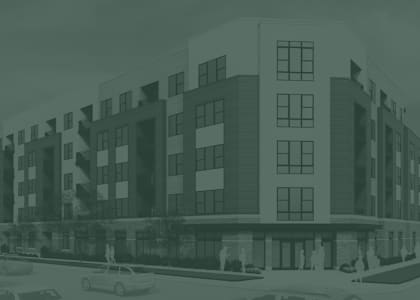 A black and white image of a modern building.