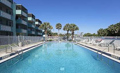 the swimming pool at the resort at longboat key club