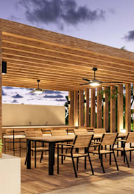 a rendering of an outdoor dining area with tables and chairs