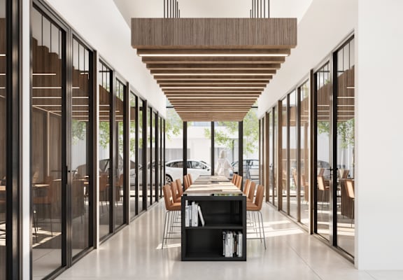 a long dining room with a long table and chairs