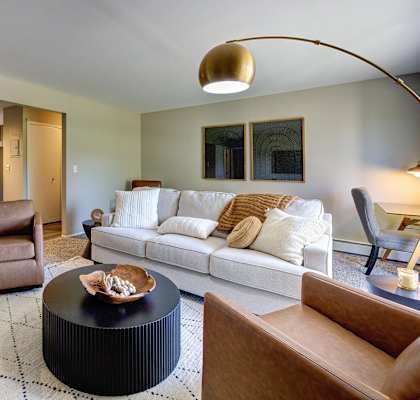 a living room with a couch and a table