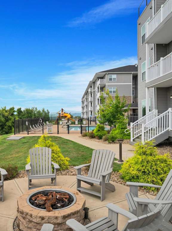Patio with a firepit at Heights at Black Bear Apartments, Morgantown, West Virginia