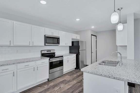 Kitchen with white cabinets at Heights at Black Bear Apartments, Morgantown, WV, 26501