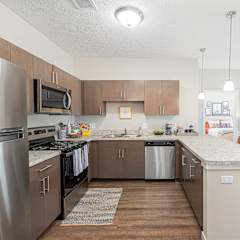 our spacious kitchens are equipped with stainless steel appliances and granite counter tops