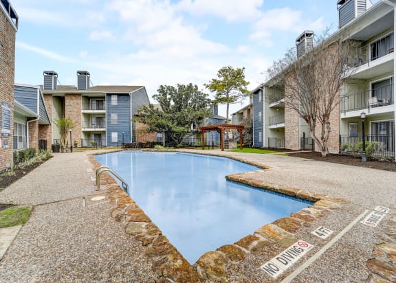 the swimming pool at the preserve at polk apartments