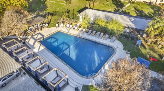 pool at the enclave at woodbridge apartments in sugar land, tx  at Sunset Ridge, Texas, 78209