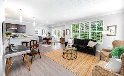 a living room with a couch and a table