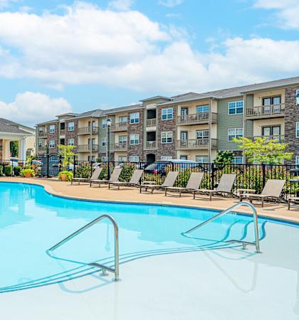 the swimming pool at the preserve at polk apartments