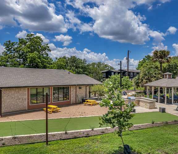 a backyard with a grassy area and a gazebo at Sunset Ridge, Texas