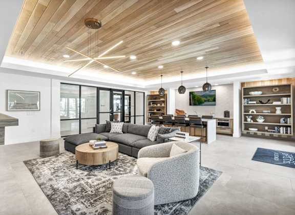 a living room with a couch and a table