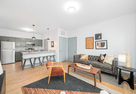 a living room with a couch and a table
