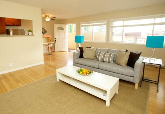 a living room with a couch and a coffee table