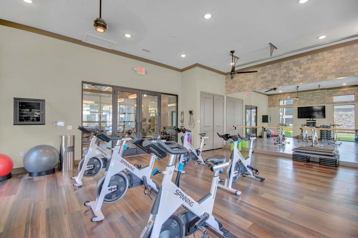 Vintage Winter Park Apartments fitness center with bikes - Winter Park, FL