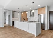 Thumbnail 2 of 28 - Kitchen with Premium Fixtures and Finishes